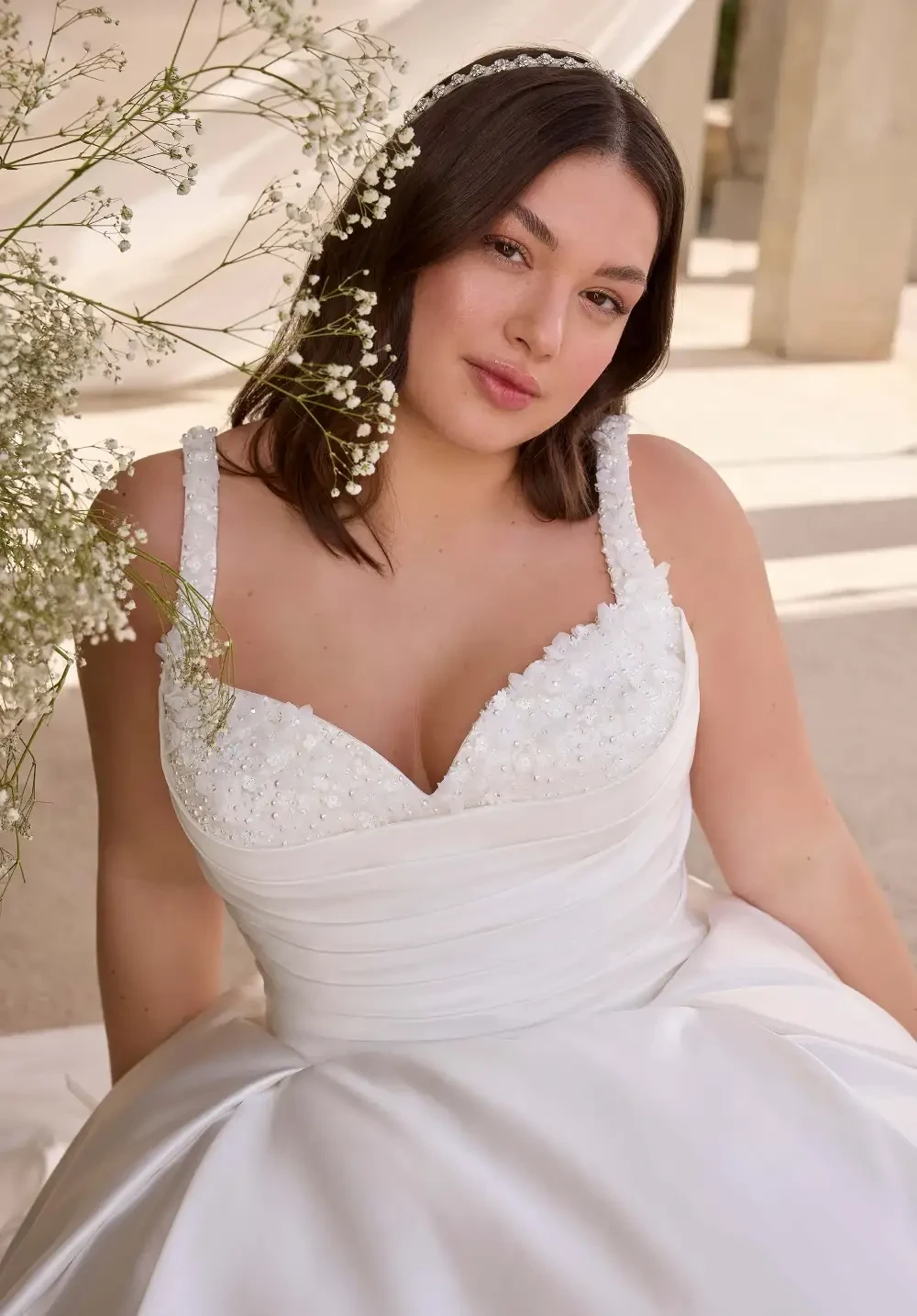 Model wearing a Plus Sized gown