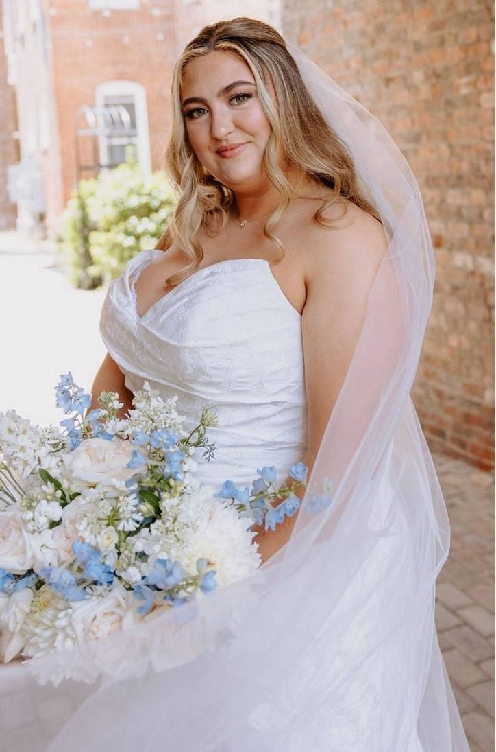 Model wearing a Plus Sized gown