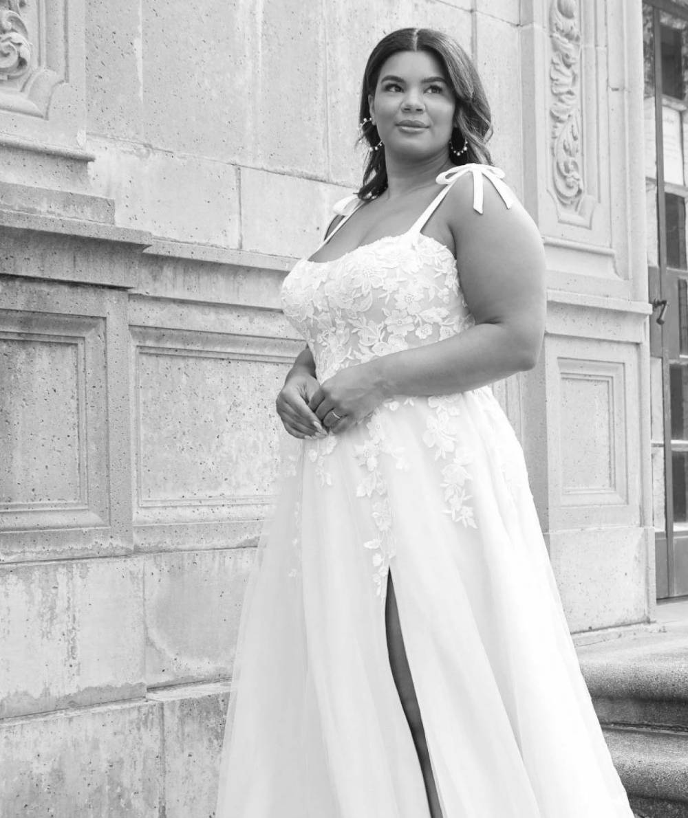 Model wearing a Plus Sized gown, grayscaled image